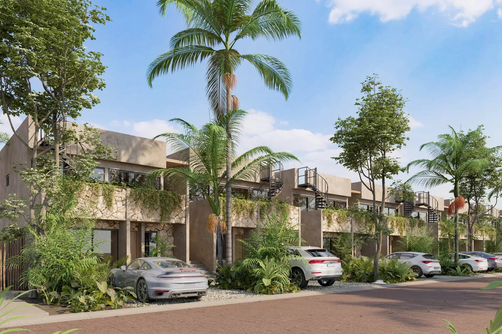 Façades des duplex KAONI avec terrasses végétalisées et escaliers vers les rooftops, La Reserva